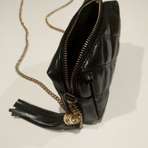 Black puffy quilted chain purse